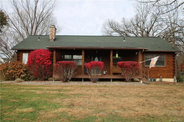 Charming 2 bedroom 2 full bath log home. Amenities include covered front porch, screened rear porch and uncovered deck. There is also a 2 car detached garage.