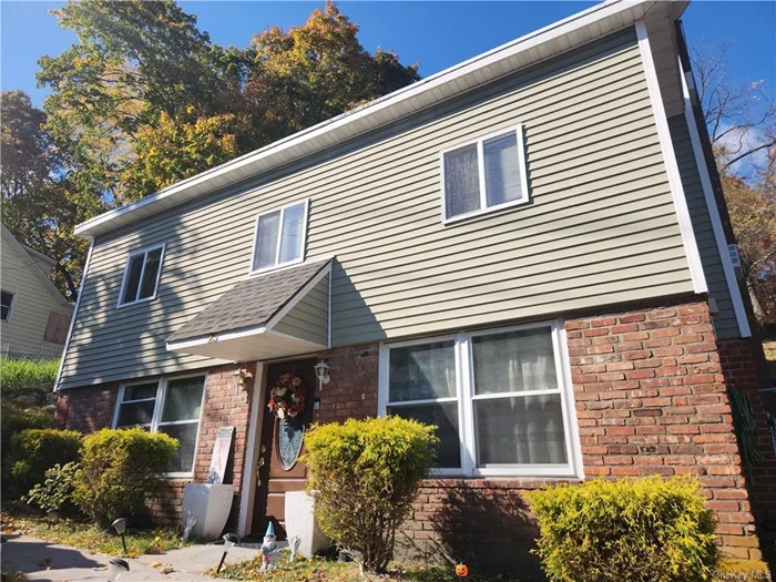 WELCOME HOME to this charming 4-bathroom, 3-bedroom Colonial home that offers the perfect blend of historic character and modern convenience. The first floor includes a spacious living room, office area, dining space, kitchen, and full bathroom. The second floor contains three bedrooms and a very large bathroom. The full attic is perfect for storage space while the finished basement has its own entrance, a full bathroom, a kitchenette, and an additional bedroom. Situated on a spacious lot, this move-in-ready home features hardwood floors, a private backyard, and four parking spaces. Enjoy the peace and quiet of Stony Point living, with easy access to local amenities and outdoor activities. Close to NYC & more!