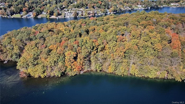 Discover a rare opportunity to own a piece of untouched paradise on Canopus Island, nestled in the scenic Lake Mahopac.? This expansive 20, 104 square-foot lot offers the perfect canvas for a peaceful retreat. Surrounded by nature, enjoy serene water views, lush greenery, and the tranquility that island living provides all just a short boat ride from the mainland. The sellers are open to seller financing options, making this opportunity more accessible. Permanent concrete structures are not allowed on this parcel, only tents, glamping structures, and a dock are approved for this parcel.