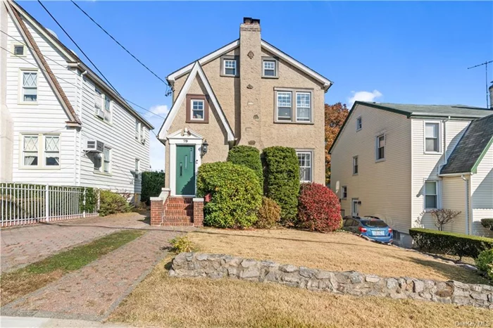 Welcome to 79 Onondaga, nestled on a quiet and well-maintained street in the Dunwoodie neighborhood of Yonkers. This beautiful and meticulously cared for colonial has a ton of charm and been lovingly updated for the past 14 years! A rare find in the area, this home boasts three floors of finished living space. The primary and secondary bedrooms are flooded with natural light and leave room to spare. On the parlor floor, cozy up next to the wood-burning fireplace or entertain in the fully renovated kitchen, which seamlessly opens to a spacious screened-in porch, overlooking a fenced yard with a fire pit and surrounded by mature trees. The lower level is perfect for guests or an in-law suite. The rest of the house, well, see for yourself! Conveniently located less than 30 minutes to Manhattan, close to Bronxville, Metro North, shopping, and Dunwoodie public golf course. Whether you are looking for a starter home or a home to grow into, this checks off all the boxes. Come visit us soon! ConstructionDescription: Stucco,