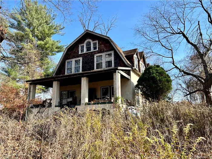 Looking for a project? This storybook home is waiting to be brought back to life. Located in the Wallkill School District on a beautiful country road is this 4 bedroom and 1 bath two-story home on a level 1.5 acre lot. The original home built in 1890 looked like a quaint country cottage right out of a fairytale. Time for a new owner to make it what it was once. Centrally located to commuter roads, 75 min. to NYC, convenient to Stewart International Airport, Metro North train to Grand Central Station, Mohonk Mountain and Minnewaska State Parks, area wineries, including family owned and operated Magnanini winery, breweries, Angry Orchard and local area farm stands.