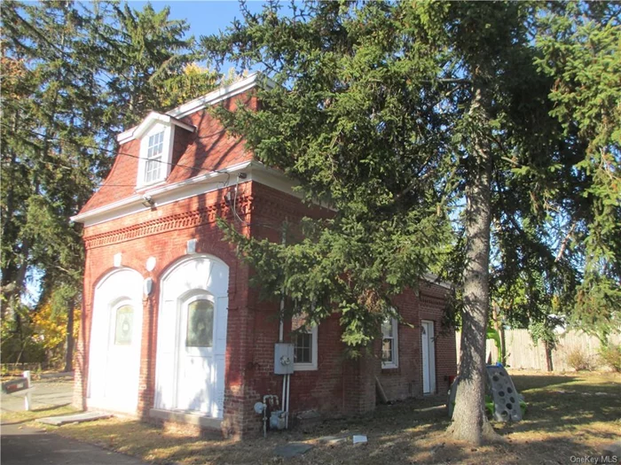 UNIQUE OPPORTUNITY TO RENT ENTIRE TURN OF CENTURY BRICK CARRIAGE HOUSE. (circa 1900) Enter spacious living room, with decorative stone fireplace, all brick walls, high ceilings. Walk up to the second floor loft, to use as bedroom. Also high vaulted ceilings, plenty of space for bedroom furniture and more. Located along river front,  First Street. Private parking