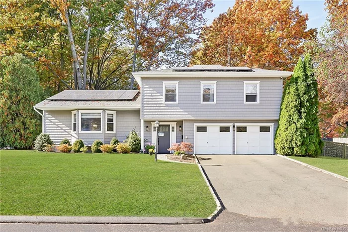 Welcome home to this beautiful 3 Bedroom, 2.5-bath Split in the award-winning Blind Brook School district. Ideally situated in a prime Rye Brook neighborhood, 63 Rock Ridge Drive offers a flexible layout perfect for growing families and those who love to entertain. Upon entering, you&rsquo;re welcomed by a warm, inviting living room, while just ahead, the cozy family room w/wood-burning fireplace and sliding glass doors opens to your backyard retreat ideal for gatherings or quiet relaxation. Upstairs, discover 3 spacious bedrooms with generous closet space, plus an open-concept kitchen designed for modern living. Outside, the home&rsquo;s new vinyl cedar-impression shingles, expansive Trex deck, & patio provide both beauty and functionality, complete with a play area for added versatility. Not to be overlooked, the solar panels enhance the home&rsquo;s efficiency, keeping utilities lower year-round. Enjoy all that Rye Brook has to offer from this move in ready gem!!!