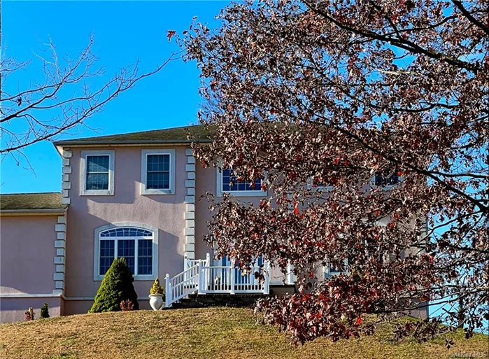 Timeless Charm Meets Modern Comfort! This custom-built Colonial sits on a peaceful hilltop cul-de-sac, blending classic design with contemporary ease. Enter through a grand two-story foyer with tray ceilings, sunlit spaces & hardwood floors carrying you through a flowing layout. From the living and dining rooms into a fully updated gourmet kitchen, a dream for any chef with ample counter space. Just off the kitchen, a cozy sitting area with a fireplace beckons for warm gatherings & relaxation. One of the home&rsquo;s most impressive features a gorgeous bonus room is a MUST-SEE! Upstairs, the primary suite offers a peaceful retreat with dual walk-in closets & jacuzzi soaking tub. 3-additional bedrooms with tray ceilings ensure space for all. Expanded 2-car garage & spacious 8-car driveway adds convenience. This home is surrounded by nature, peace, views & includes a central vacuum system. PICTURES ARE COMING SOON. Appliances: Electric Water Heater ConstructionDescription: Stucco,