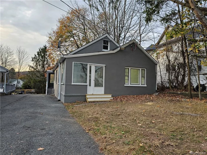 Located in the amenity filled Sullivan County, This adorable Ranch with a Cape flare had just taken a makeover and waiting for you to move right in. When you enter the home the gleaming hardwood floors greet immediately. The fresh smell of paint lingers as you walk around. Both bathrooms sport beautiful modern tiles and so much more. Thee upstairs offers a bonus room and the huge basement is perfect for storage or can be easily finished for more room. The backyard greets you with a fire pit and plenty of space for family BBQ&rsquo;s