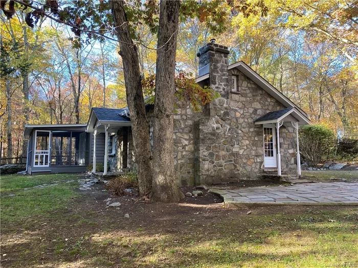 Artists, writers or just plain want to get awayers! Storybook stone cottage has it all! 4.8 acres of total serenity & seclusion. 1 BR, 1 bath, LR w/cathedral ceilings, exposed beams & fplc w/wb stove insert, wood flrs in LR & BR. Newer kitchen w/Silestone counters, tile floors. Primary bedroom with French doors to screened porch. Level & cleared. Full of surprises each season! New asphalt driveway. Subject to credit report, credit score of 700 or better, proof of income & references. Tenant pays all utilities including lawn care, snow removal, garbage removal. Seasoned wood only for wood burning stove insert. Absolutely no pets!