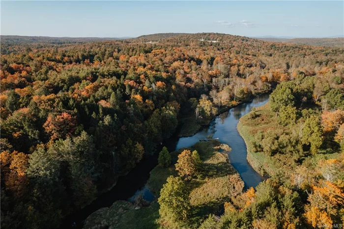 Looking for river front property to build your dream home!? Don&rsquo;t miss this beauty in the Sullivan Catskills! This lot is part of a river front subdivision in the outskirts of Monticello on the Neversink River. Close to New Holiday Mountain, Resort World Catskills, Kartrite water park, shopping, commute but yet very rural. Camper included! start your adventure today! Call for your appointment today!