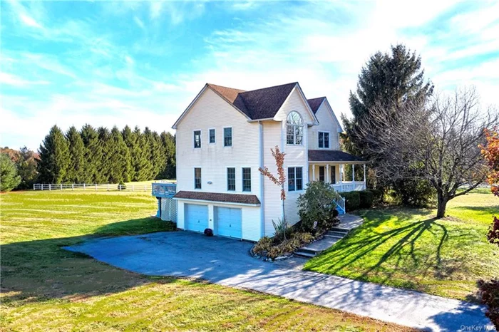 Welcome to your dream home nestled in the premier neighborhood of Dutchess Farms in LaGrange, where comfort meets elegance on a beautifully maintained 1.18 acres of level property. This bright and airy residence, featuring a delightful wrap-around farmer&rsquo;s front porch, offers an inviting ambiance that will make you feel right at home from the moment you arrive. Step inside to discover a thoughtfully designed interior that seamlessly combines modern updates with classic charm. The heart of this home is undoubtedly the cook&rsquo;s delight kitchen, equipped with newer stainless-steel appliances and stunning quartz countertops. Whether you&rsquo;re preparing a family meal or entertaining guests, this kitchen is sure to inspire culinary creativity. The spacious living room is a perfect gathering spot, complete with a cozy wood-burning fireplace that adds warmth and character to the space. Sliding glass doors lead you to a large deck, ideal for outdoor entertaining or simply enjoying the view of your expansive backyard. The outdoor area features an impressive Unilock patio, providing additional space for relaxation and entertainment amidst your mostly private yard. This home boasts 3.1 bathrooms, all stylishly updated with newer vanities, mirrors, lighting fixtures, and toilets. The convenience of a main floor bedroom and full bathroom is perfect for guests or multi-generational living. The home is designed for comfort, featuring recessed lighting and central air, ensuring a pleasant atmosphere year-round. Flexible work from home space with an in-home office. Gleaming hardwood floors and freshly painted walls enhance the home&rsquo;s contemporary feel. Retreat to the large primary bedroom, which is a true sanctuary with its vaulted ceilings, palladium window, and a spacious walk-in closet. The ensuite bathroom provides a private oasis for relaxation, complete with modern fixtures and ample space. Additional features include a main floor laundry room for your convenience, and a lower-level media room that&rsquo;s perfect for movie nights or game days. This versatile space also includes a gaming area and a bar, along with a half bathroom, making it the ultimate entertainment hub. With plenty of storage options throughout the home, you&rsquo;ll have all the space you need to keep your belongings organized and accessible. The property is conveniently located just one minute from the Taconic State Parkway and Stringham Park, offering easy access to outdoor activities and commuting routes. The roof was replaced in 2011, ensuring peace of mind for years to come. Don&rsquo;t miss out on this exceptional opportunity to own a beautiful home in LaGrange, where comfort, style, and convenience come together in perfect harmony. Schedule your viewing today and take the first step towards making this lovely property your own!The enchanting Hudson Valley offers vineyards, parks, walking trails/Rail Trail, antique shops, cozy cafes and an abundance of culinary-grade and farm-to-table restaurants. Showings to start Sun. Please remove shoes or wear booties.