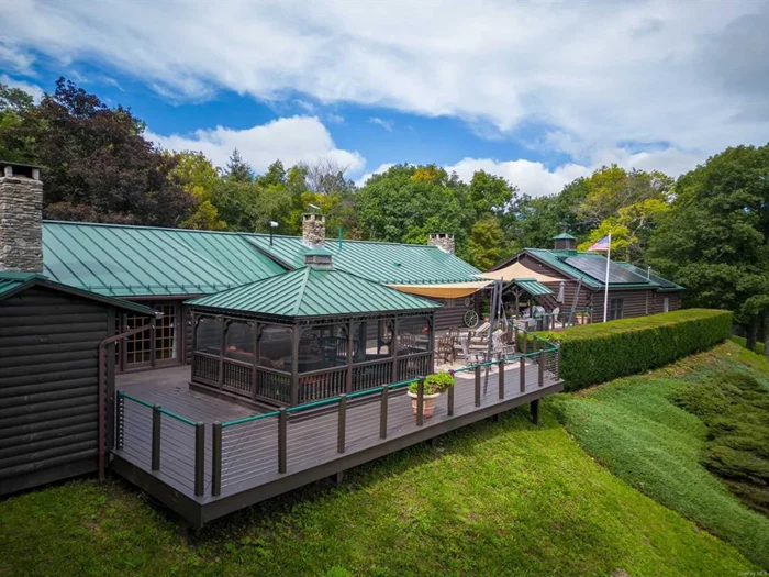 Meticulously Maintained ELEVATED Log Cabin-Style home and horse barns on 19+ acres with BREATHTAKING Mountain Views. Set off a quiet country road, this stunning setting with impeccably manicured grounds captures one&rsquo;s attention upon arrival. One is immediately drawn to the expansive wood deck complete with built-in grill and impressive screened-in gazebo with fire-pit. This is unquestionably the perfect entertainment perch which captures the expansive long views of the valley and hillsides. Fabulous open floor plan inside, with vaulted ceilings in living room with stone fireplace, large dining area, and light and bright gourmet eat-in kitchen with high-end appliances. Primary bedroom also has vaulted ceilings, stone fireplace, and large walk-in closet leading to primary bath. Den/study off of primary bedroom. Another great entertaining space is found downstairs including a large area perfect for games, exercise or media room with kitchenette. Also downstairs is a large second bedroom and updated bathroom. 3 car heated garage with massive storage space upstairs. 45KW generator. For the horse enthusiast, the property also includes a hay barn, paddock, 4 stall horse barn & tack room, equipment sheds and arena. Great riding trails abound. This exceptional property is move-in ready and utterly magical.