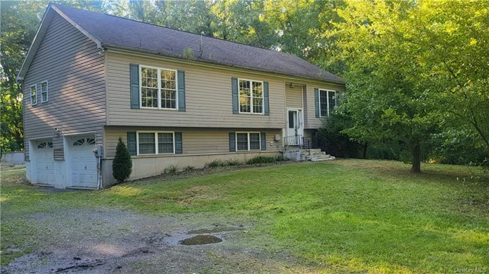 A great location surrounds this three bedroom, two bath 2002 Raised Ranch for sale bordering I-87 (Thurway) Parcel includes an over 4 acre lot with house offering a baseboard/oil heating system, central air system (needs compressor), two car garage, spacious deck and more. Property and house appears neglected and needs repairs and renovations. This is an Approved As Is Short Sale Property***Agents, please see other remarks for more information.