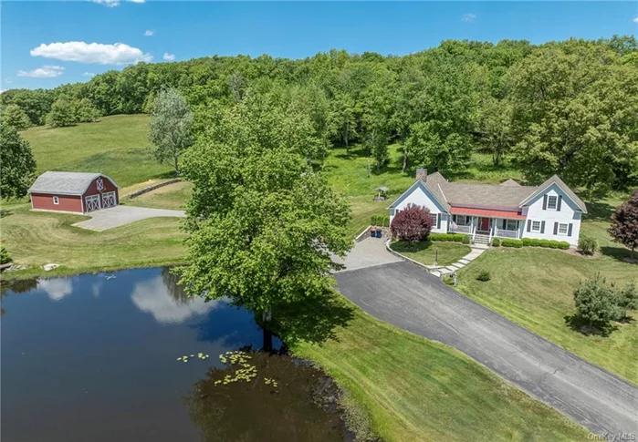 Quintessential Hudson Valley Farmhouse. Nestled at the end of a country road in Gallatin overlooking your own stocked fishing pond, is this storybook setting with 265.17 acres of privacy. The home was newly constructed in 2011 from the original c.1787 homestead keeping some of the original details in a few rooms. A modern great room with soaring 14&rsquo; beamed ceilings and a stone fireplace is the focal point of the house. A screened porch off the kitchen expands the space for summer evenings to dine. There is a primary suite on the first floor plus an additional bedroom, full bath and foyer. Upstairs, are two bedrooms and a full bath with one of the bedrooms having the original pine floors, wood paneling and beams. A detached oversized 2+ car garage/barn has many possibilities. Hardie Board siding, efficient utilities, A/C, and a whole house generator add to the appeal of this property. Delight in the peace and serenity this property offers with trails throughout the woodlands. Just 15 minutes to Pine Plains, 25 minutes to Rhinebeck, 2.5 hours to NYC and easy access to the Taconic State Parkway. Subdividable.