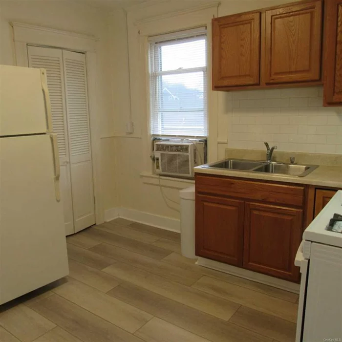 Spacious, super clean 1 br 1 ba 4 room apartment. Rental terms negotiable. EIK w/large pantry, full modern bath, private deck off kitchen. Freshly painted w/new flooring in kitchen, pantry and bathroom. Northside Poughkeepsie, close to the Walkway over the Hudson. Tenant pays electric, hot water and gas (heat). Included in rents are: city water, trash and internet. Shared coin operated washer/dryer laundry area in basement for tenants use. 1 car off street parking per unit. Smoke free property (no smokers). No pets. Credit scores 650+. Security camera in use in parking area., Basement:Interior Access, Cooling:Ceiling Fans, EQUIPMENT:Carbon Monoxide Detector, Smoke Detectors, ExteriorFeatures:Landscaped, Outside Lighting, FLOORING:Vinyl, FOUNDATION:Block, Heating:Gas, InteriorFeatures:All Window Treatments, OTHERMFTRS:Window Treatment, OTHERROOMS:Laundry/Util. Room, Pantry, OwnerPays:Fire Insurance, Maintenance, Sewer, Taxes, Water, RentalTerm:Flexible/TBD, ROOF:Asphalt Shingles