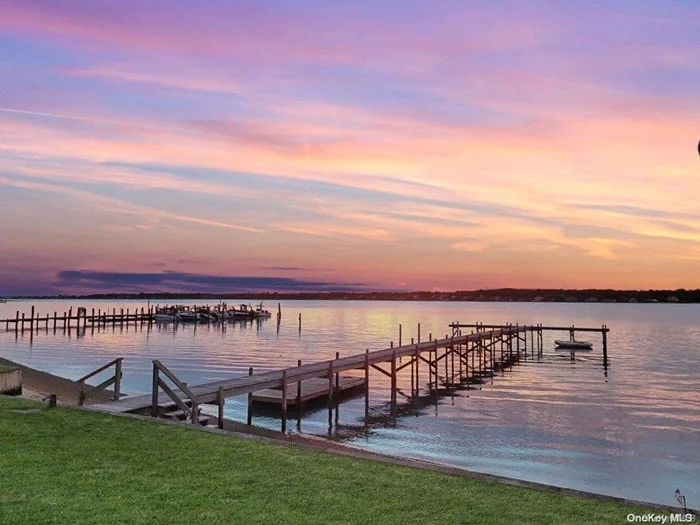 **Charming Waterfront Pied-a-Terre** Discover your dream retreat in the heart of Hampton Bays with this exquisite waterfront pied-a-terre. Nestled along the serene shores of Rampasture Road, this charming residence offers breathtaking sunset views that paint the sky with hues of orange and pink every evening. Step inside to find a cozy yet elegant living space, perfect for a tranquil getaway. Embrace the waterfront lifestyle with direct access to clamming and boating right from your doorstep. Whether you&rsquo;re an avid sailor or simply enjoy a leisurely day on the water, this location offers endless opportunities for aquatic adventures. Outside, a private deck provides the perfect spot to unwind and soak in the natural beauty of the bay. Enjoy your morning coffee or evening glass of wine while watching the boats drift by and the sun dip below the horizon. Located just minutes from the vibrant community of Hampton Bays, you&rsquo;ll have easy access to local dining, shopping, and entertainment options, all while enjoying the peace and privacy of your own waterfront oasis. Don&rsquo;t miss this rare opportunity to own a slice of paradise in one of the most sought-after locations on the East End. Experience the ultimate in coastal living at 46 Rampasture Road #5. Schedule your private showing today! EASY LIVING. Don&rsquo;t worry think about it in the winter and everything is taken care of in the summer! Open 6 months of the year. HOA of $615/ month includes taxes, water, cable, garbage, lawn, snow removal, irrigation, property insurance