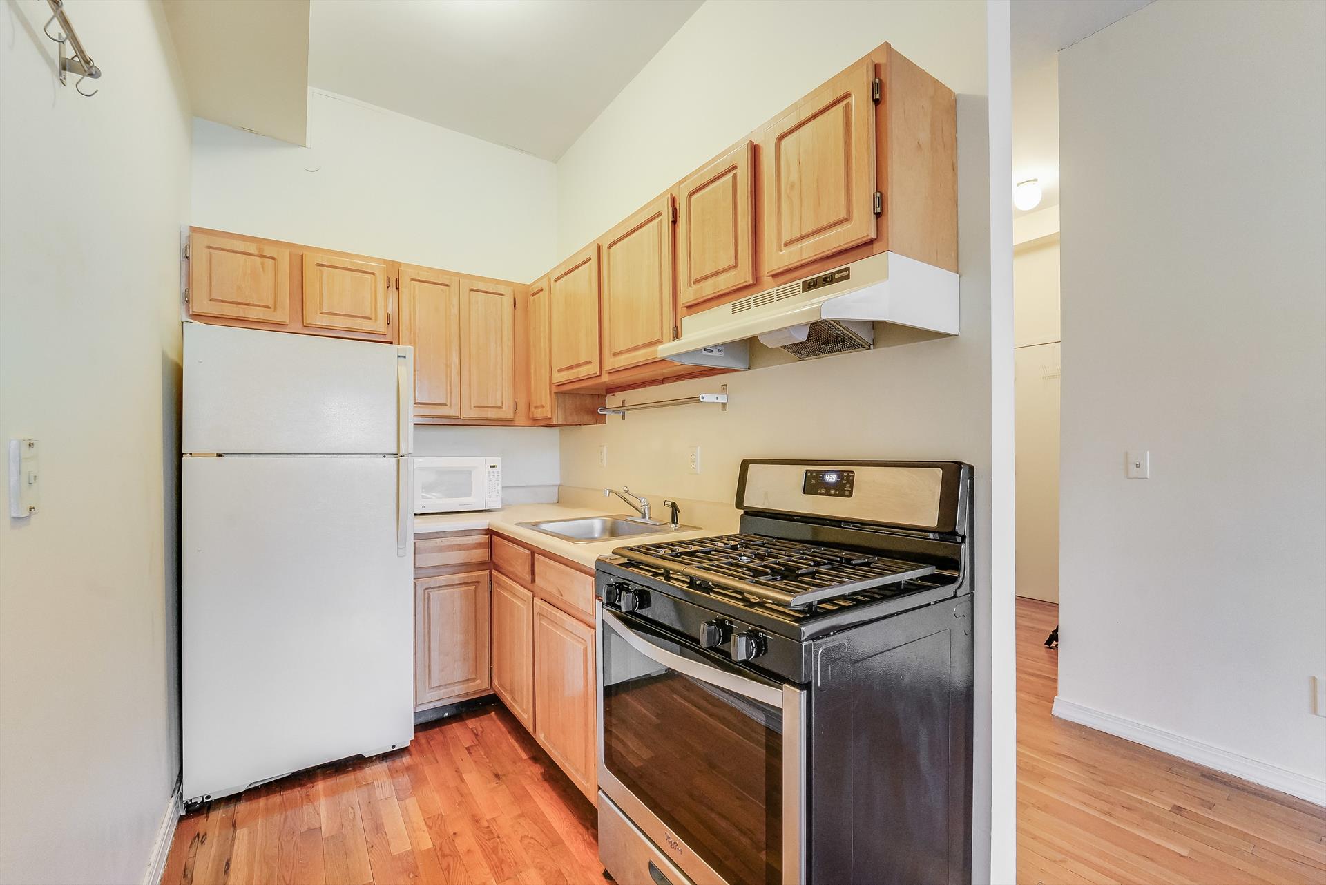 Great size 2 bed 1 bath in a prime location - Unit features high ceilings / Central air and heat / hardwood floors / washer/dryer in bldg - Great space and layout - Private outdoor space / Prime location to all night life and transportation to NYC. PICTURES OF SIMILAR UNIT IN BUILDING*