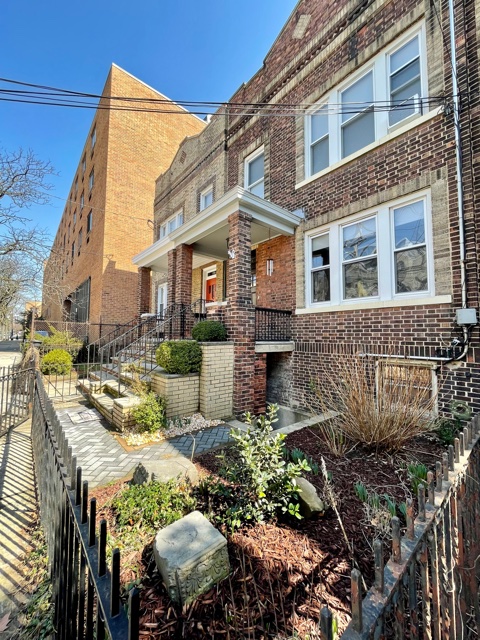 Perched atop Ogden Avenue on the edge of The Palisades cliff, overlooking bustling Hoboken with phenomenal views of the NYC skyline, and a few blocks from the Hudson-Bergen Light Rail elevator, sits a historic brick row home. Enjoy a great flow throughout the home with parquet wooden floors throughout, ceiling medallions, exposed brick, French doors, arched windows, stylish light fixtures and a skylit stairway. Entertain and create your favorite dishes from your lavish modern kitchen with a very expansive granite center island with seating, pendant and recessed lighting, upgraded stainless steel appliances, white shaker cabinetry, and a breakfast nook. Serve your creations in a separate dining room right off the living room. Sip your morning coffee or tea on a generous sized deck overlooking a charming English garden facing the NYC skyline.  This 1,520 square foot home has three bedrooms, two full modern tiled baths, a split two- zone central air system, window ac’s and numerous ceiling fans.  Additionally, a huge 65” flat screen TV and Sono sound bar is included along with an LG stainless steel washer/dryer. Conveniently located close to Hoboken, Choc o Pain French Bakery, hip new restaurants and cafes, NYC transportation, the "100 Steps" steel stairway to Hoboken leaving you at 2nd St Light Rail station, and a great park! Rental parking nearby for $265/mo. No pets. Available 7/15/22. Option to be rented with furnishings.