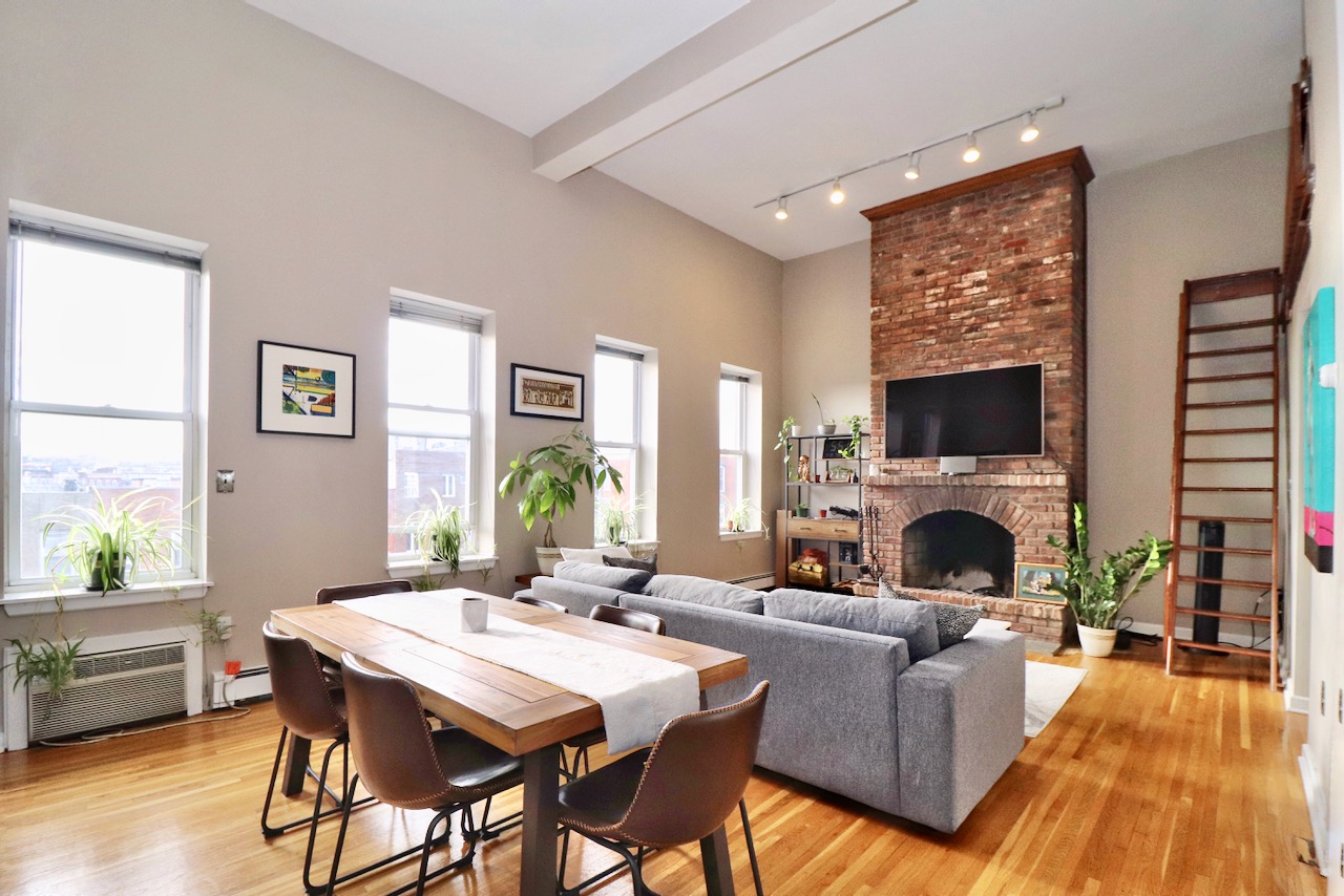 This spacious, sun-filled one bedroom apartment is centrally located in the heart of Hoboken on coveted Washington Street. Steps away from the bus stop to NYC and walking distance to the PATH train, makes this great for commuters who can also enjoy nearby shops, restaurants, and nightlife. This charming, ~900 sq ft apartment features a wood burning fireplace with exposed brick, high ceilings, spacious loft for extra storage, skylights, hardwood floors throughout, and a kitchen equipped with stainless steel appliances including a dishwasher and built-in microwave.  The over sized bedroom is complete with a walk-in closet and plenty of sunlight with skylight above. Laundry in the building. Check out the virtual tour!  $2800/month, 1.5 month security deposit, tenant pays broker fee and utilities.