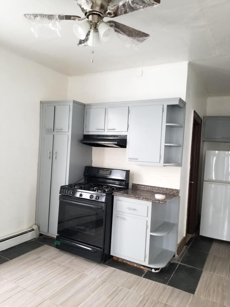 NO SHOWINGS UNTIL 5/21!  Move into this charming downtown Bayonne 2 BR located at 149 10th Street.  Features: great natural light, dark hardwood floors throughout, living room, eat-in kitchen with gas stove (NO REFRIGERATOR), 2 bedrooms with closets, full bathroom with tub, ceiling fans, 2nd floor of a walk up, cold / hot water included, tenant pays for heat, gas, and electricity, close to shopping, restaurants, parks, and public transportation to NYC.  Parking available for $150 per month. NO PETS. Available June 1st.  As per current tenants, NO SHOWINGS UNTIL 5/21!  To make this lovely apartment yours: $1600 (1st months rent), $2400 (security deposit), $1600 (broker fee), $50 (credit check per adult).  