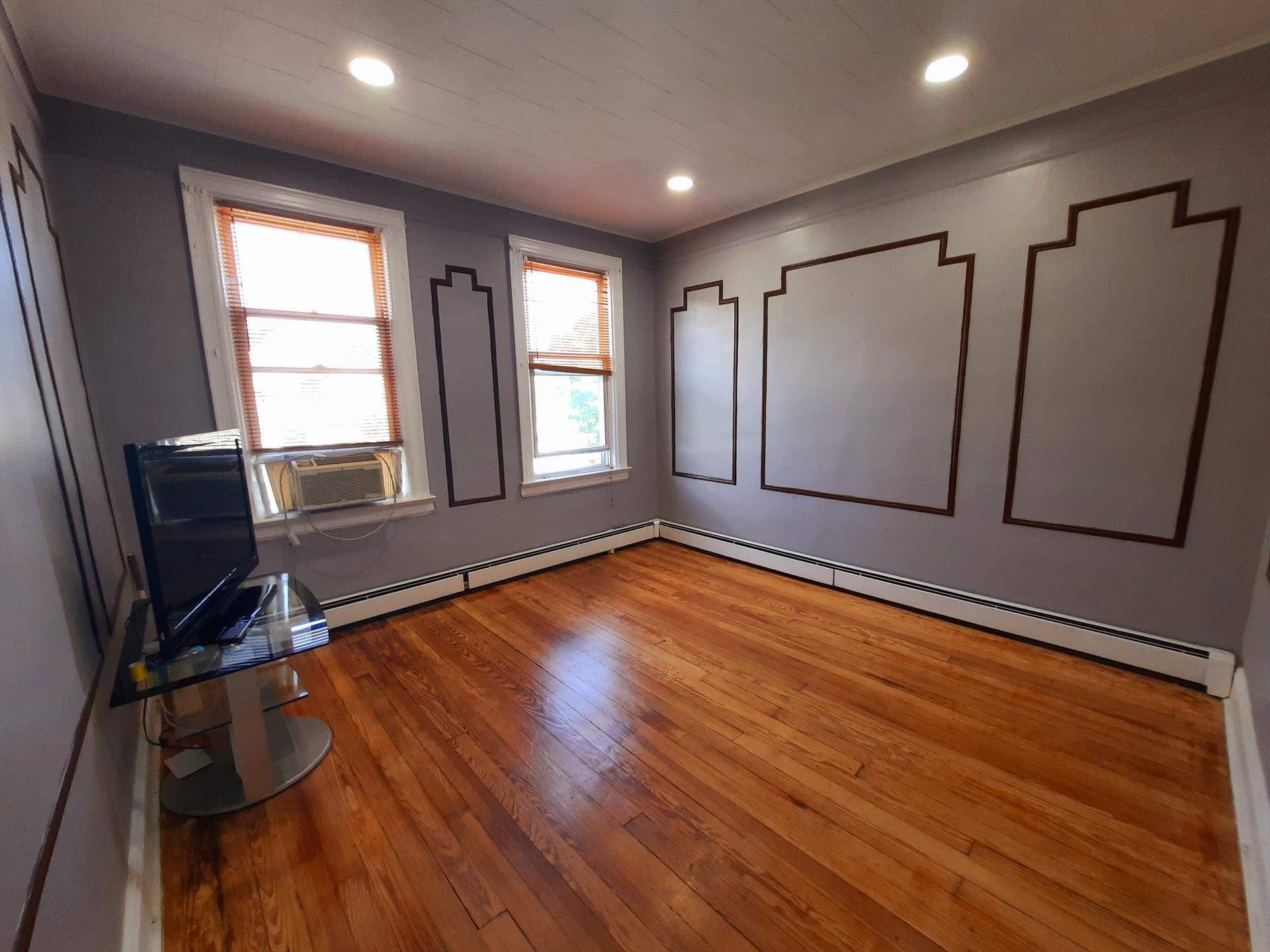 Move into this charming downtown Bayonne 2 BR located at 149 10th Street. Features: great natural light, hardwood and tile floors, eat-in kitchen with gas stove (NO REFRIGERATOR), living room (12' x 11.5'), 2 separate bedrooms with closets BR 1 (13' x 9' each), full bathroom with tub, ceiling fans, 2nd floor of a walk up, cold / hot water included, tenant pays for heat, gas, and electricity, one outdoor parking space available for an additional $100 per month. 
This lovely property is close to shopping, restaurants, parks, and public transportation to NYC.  1 cat allowed.  AVAILABLE ASAP!  To make this lovely apartment yours: $1650 (1st months rent), $2475 (security deposit), $1650 (broker fee), $50 (credit check per adult). Call Victor Alicea (Liberty Realty) at 917-617-9906 (m), or 201-610-1010 ext. 321 (o)f I am not available one of my colleagues will gladly assist you. Se habla espanol.