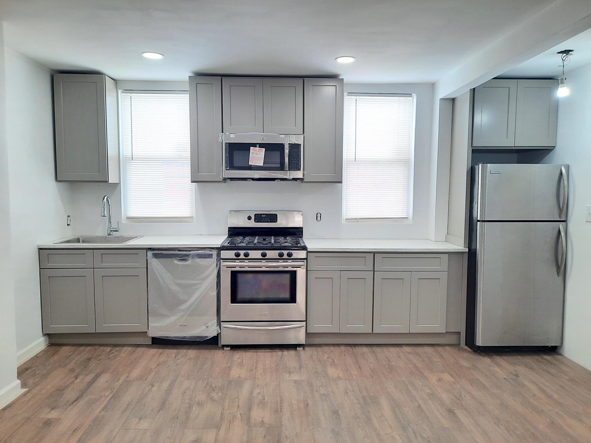 AS PER CURRENT TENANT NO SHOWINGS UNTIL AFTER SEPTEMBER 1st. Move into this recently renovated Union City 2 BR rental conveniently located on the Bergenline Avenue business district. Features: great natural light (6 windows), open modern kitchen with stainless steel refrigerator, gas stove, microwave, and dishwasher, living room (12.3' x 9'), 2 separate bedrooms (BR1: 12.3 x 9.3' and BR 2: 13' x 9'), ample closets, full bathroom with bathtub, wood laminate floors, recessed lighting, top floor of a 3rd floor walk up, close to shopping, restaurants, parks, and public transportation to NYC and the Journal Square Path. Water and sewer are included. The tenant pays for heat, hot water, gas, and electricity. To make this great apartment yours: $1850 (first months rent), $2775 (security deposit), $1850 (broker fee), $50 credit check per adult tenant.
