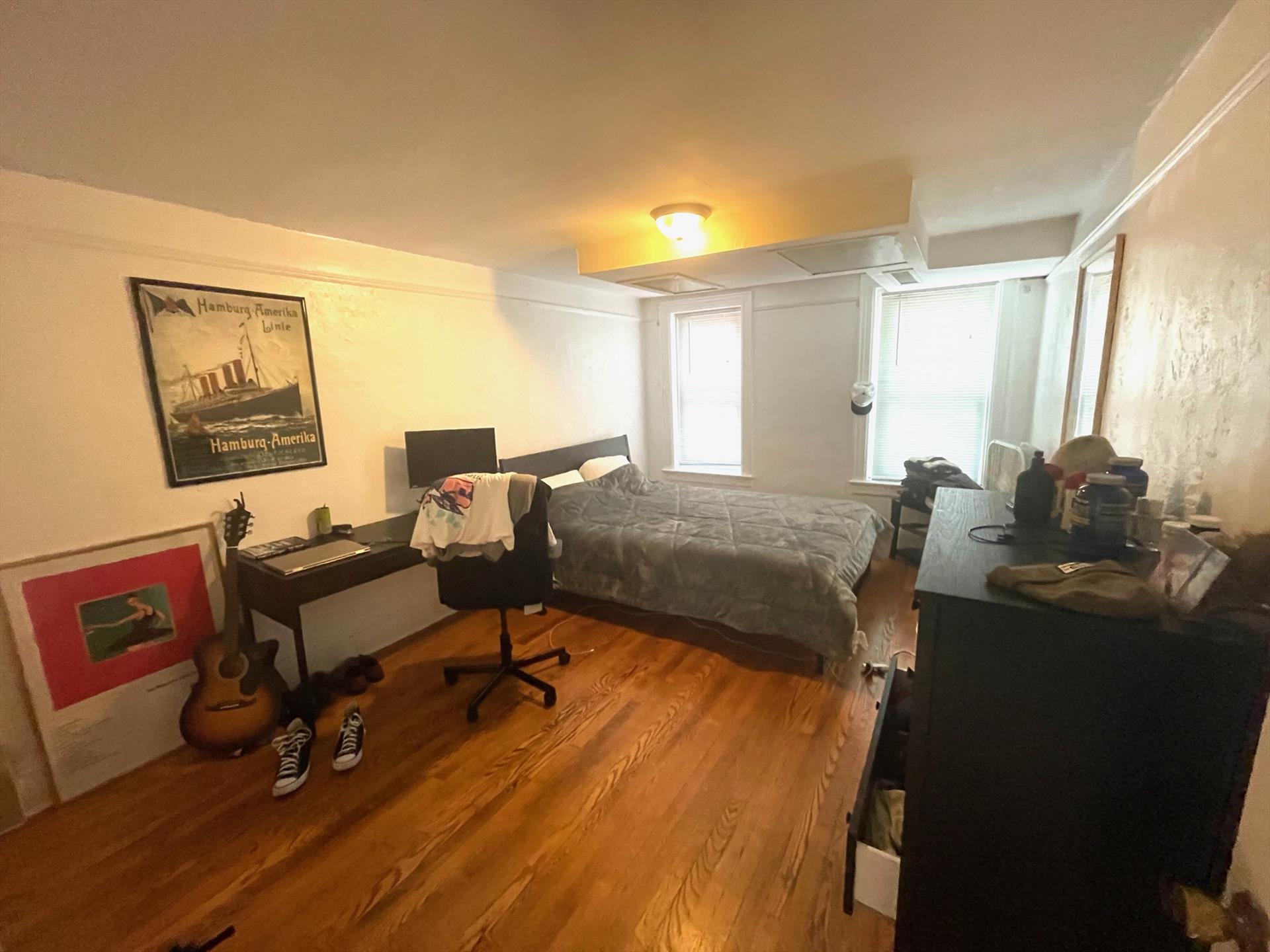 Location! Location! This 2 bedroom garden level unit features good size bedrooms, tiled kitchen, & hardwood floors in the living room. You cannot beat this location! Available 10/1. One month broker fee. 