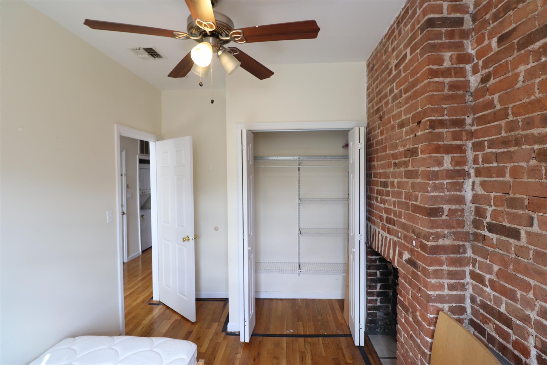 Terrific large 3 bedroom featuring exposed brick and Washer/ dryer in the unit! Other features include;  oversized living space, hardwood floors, tiled bath with full tub, good size bedrooms, high ceilings, and central heat and AC. This central location on Washington st, close to shopping and all transportation. Available July 1st. One month broker fee
