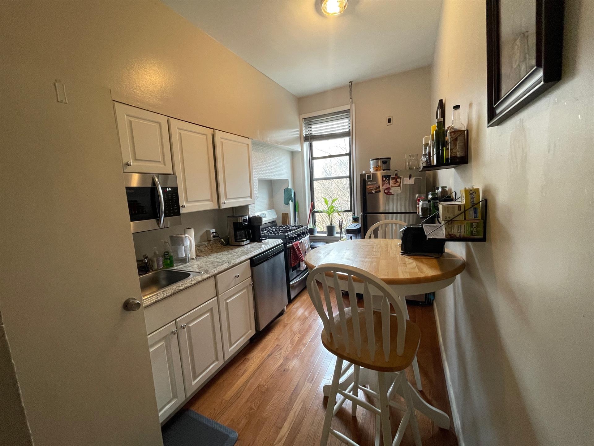 Great layout 4 bed 1 bath apartment with laundry in the unit!! Unit was renovated a few years ago w/ stainless steel appliances and hardwood floors. Available June 1st. Broker fee is 10% of annual rent. 