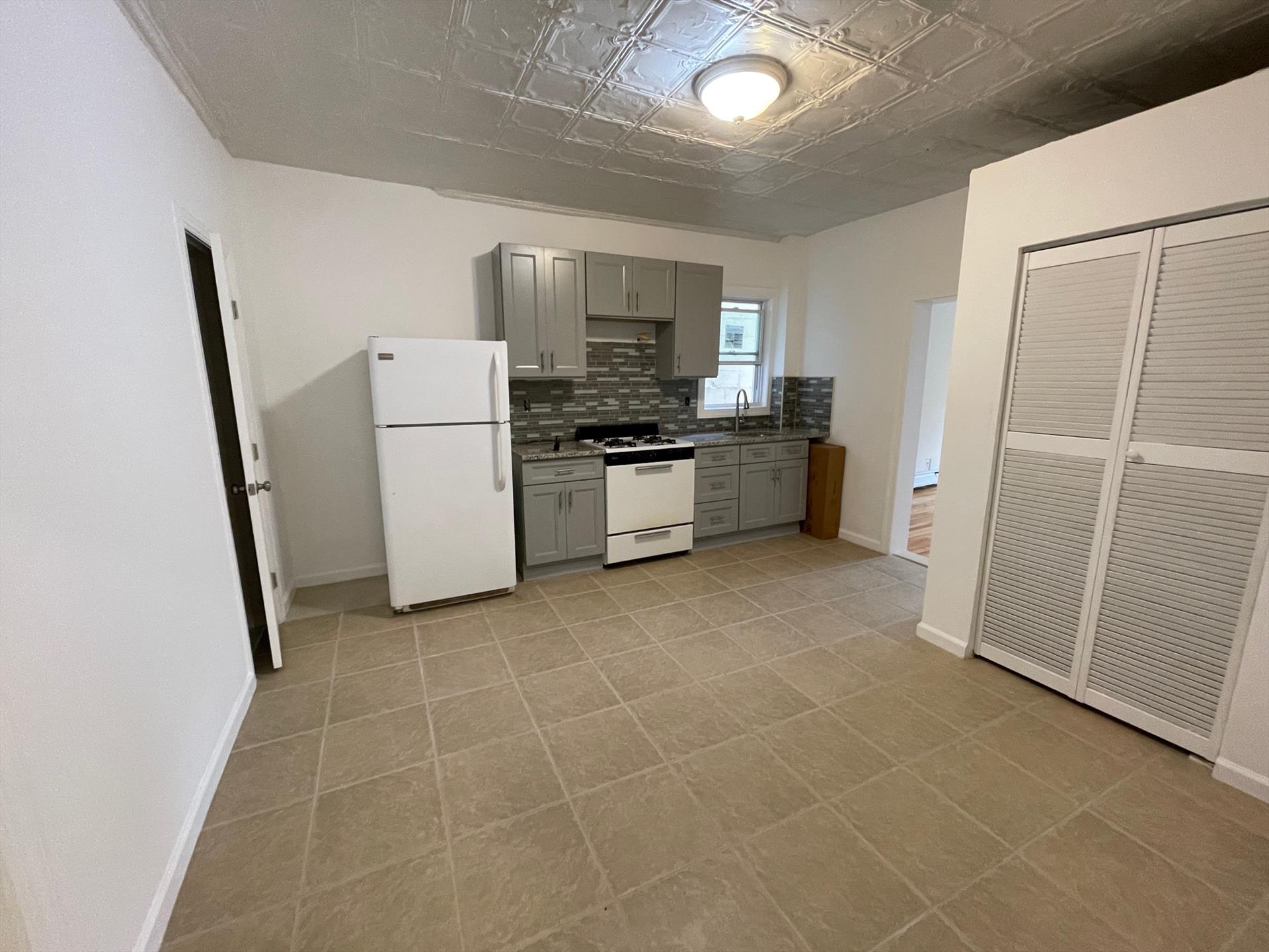 Great newly renovated 1 bedroom apartment in a central location! Apartment features an enormous walk-in closet, hardwood floors, & a newly gut renovated bathroom. This home has an efficient boxy layout with dine - in kitchen and a nice sized bedroom. Available 10/20/23. Broker fee paid by tenant.