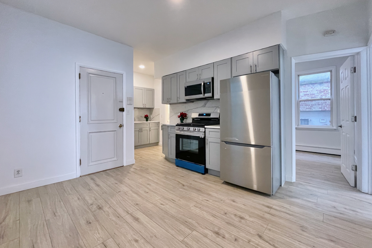 Newly renovated two bedroom apartment in Jersey City Heights! Large private deck accessed through the sliding door in the living room. New kitchen with new appliances, cabinets, and quartz countertops. All new tiled bathroom. Shared washer/dryer in laundry room downstairs. Close to transportation including NYC bus, JSQ PATH train, and easy access to NJ highways as well as the Holland and Lincoln tunnel, makes this great for commuters who can also enjoy it's close proximity to shopping on Central Ave and nearby parks including Leonard Gordon Park and Pershing Field Park. Available ASAP! Ask to see the virtual tour!