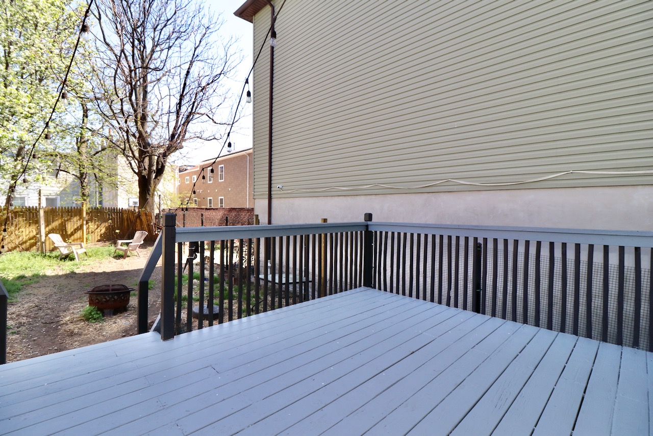Private backyard! One bedroom apartment in JC Heights located on South Street just off Kennedy Blvd. Walk out of the kitchen onto your private deck which makes it very easy for outdoor entertaining. The deck leads down to the large private backyard. The kitchen has all stainless steel appliances including a dishwasher and built-in microwave. The kitchen is open to the living room, giving the living room natural light and a spacious feel. There is a nice laundromat right across the street (Bubbles III) with wash/fold service. Buses pick you up right on the corner to take you to straight to NYC Port Authority at 42nd St and 8th Ave, or in the other direction to the JSQ path station.