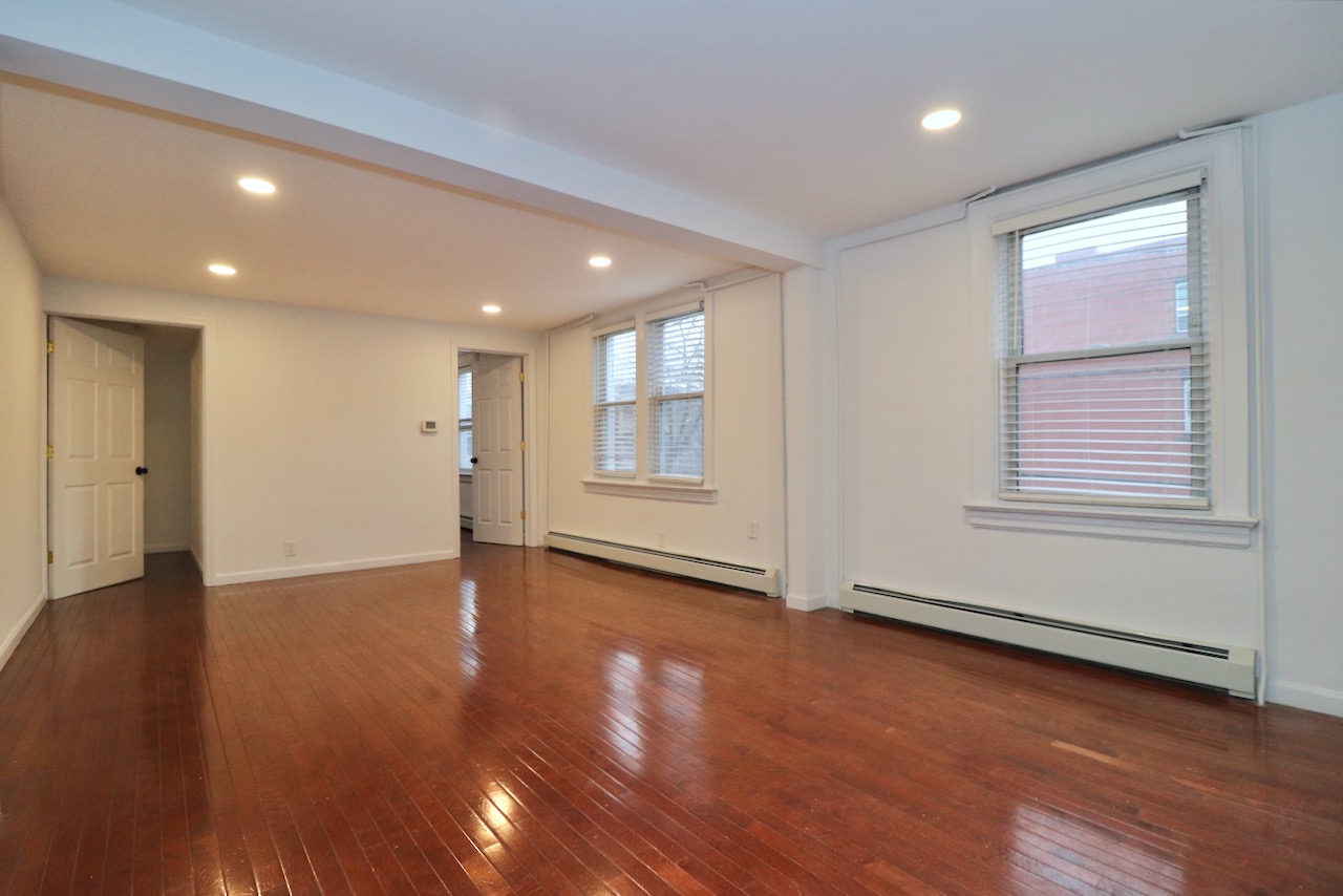 Located in a fantastic Downtown Jersey City location near the Grove St path station and Hamilton Park, this two bedroom apartment has beautiful hardwood floors. New light fixtures throughout as well as bathroom vanity. The renovated kitchen has stainless steel appliances including a built in microwave and gas stove. The corner property brings in lots of natural light with windows on three floors. Only one flight up. Laundry in building. Available ASAP! Ask for the 3D tour!