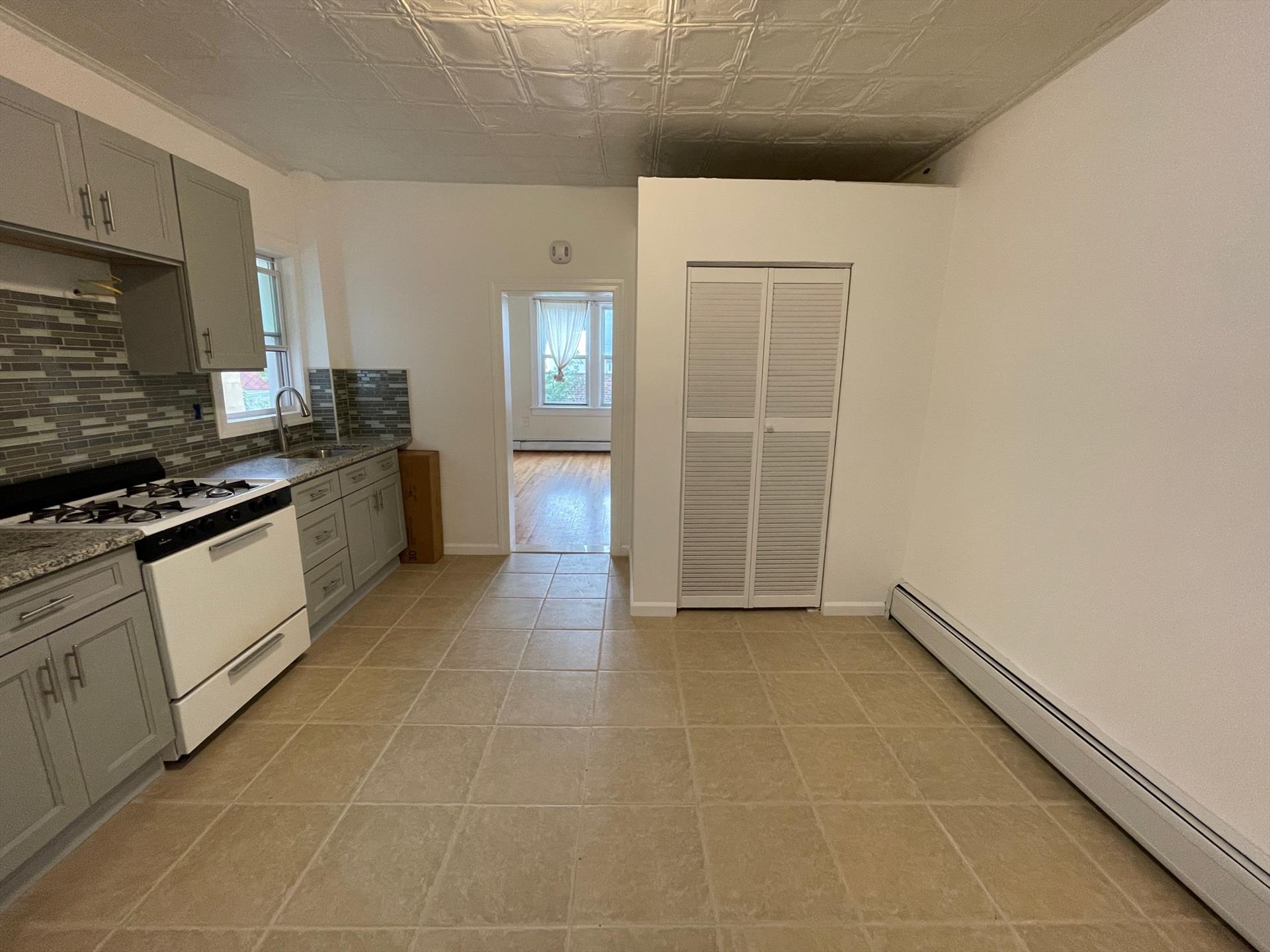 Great recently renovated 1 bedroom apartment! Apartment features an enormous walk-in closet, hardwood floors, recently gut renovated bathroom.. This home has an efficient boxy layout with dine - in kitchen and a nice sized bedroom. No laundry in building. Available 9/7/24. Tenant pays broker fee.