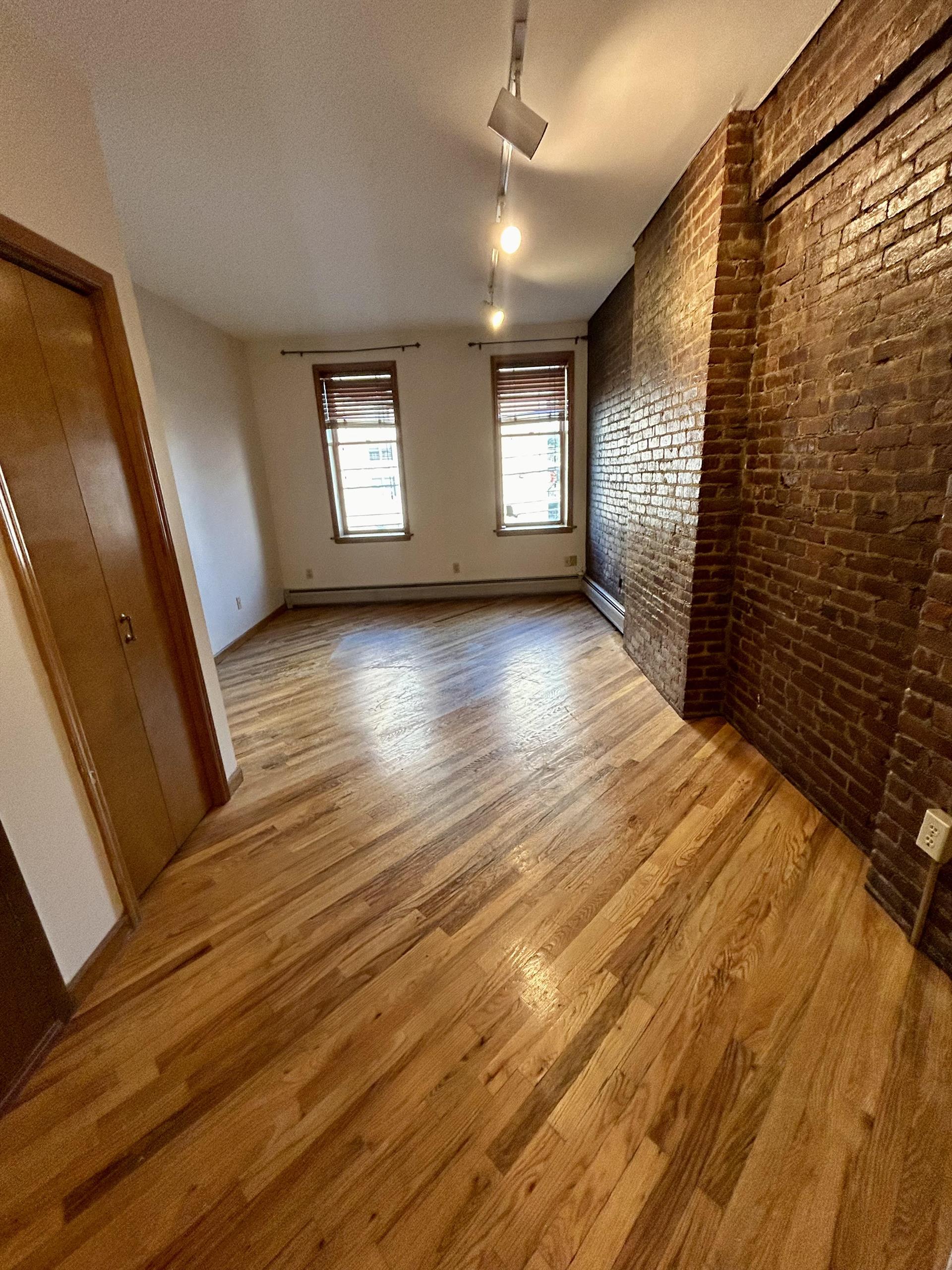 Recently renovated 1BR/1BA on 2nd & Jefferson!  Great layout with beautiful hardwood floors, exposed brick and plenty of closet space. Downtown location makes it the ideal Hoboken condo! 
Many close public transit options – light rail, bus, PATH train.  A short walking distance to eateries & shops on Washington Street.  Kitchen & bathroom were just completely renovated.
Pets considered on case by case basis.  Common use Washer/Dryer on 1st Floor.  No smoking.  Street Parking.  Available 9/15.  
1 year lease.  At lease signing, tenant responsible for: 1 month rent & 1 month security.  Credit check & income verification (3x rent).  Homeowner is also the listing agent.