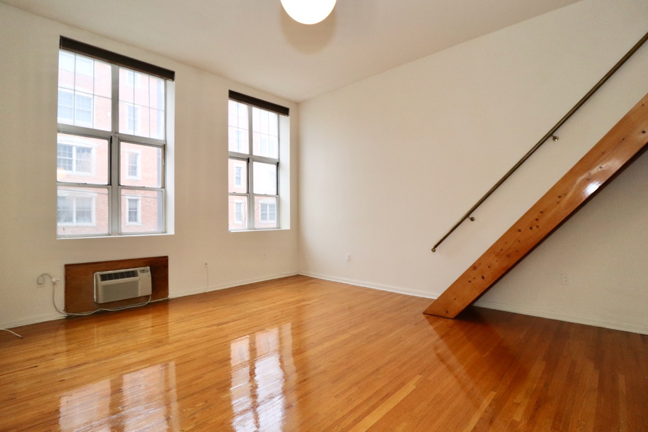 This spacious loft studio has very high ceilings and large windows that face south bringing in lots of natural sunlight. Hardwood floors and a kitchen equipped with a dishwasher and plenty of storage space. The lofted area up the stairs allows you to put a bed up there if you choose which frees up lots of space in the main living area. Laundry on every floor. Great location with close proximity to shopping and the surrounding restaurants in the area. Available December 1st!