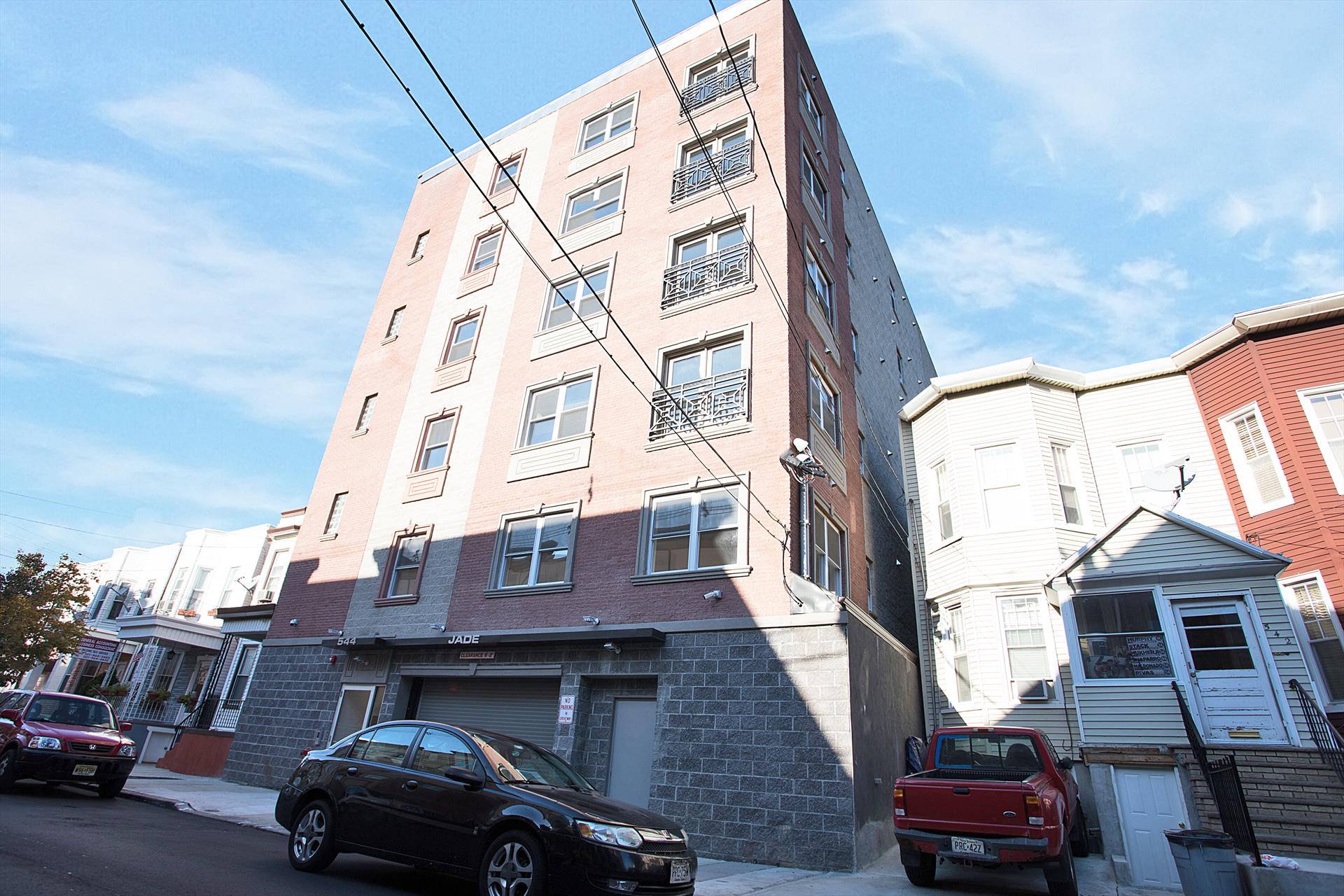 Indoor parking included! Welcome to Jade Union City, an 18-unit residential community completed in 2017. This 2 bed 2 bath is located in a 6 story elevator building was solidly constructed with block, concrete and light-gauge steel framing. Located half-block east of the main Express NYC bus route and half-block west of the city's bustling shopping, dining and entertainment district. All is residential units feature a dishwasher, gas range,  42" cabinets, Italian marble counters, onyx back splashes, hardwood floors, 9 ft ceilings, in-unit washer/dryers, central HVAC systems. Photos of samples of the different or similar layouts in the building - not actual. 1 Indoor assigned parking space included. Available Jan 2025.