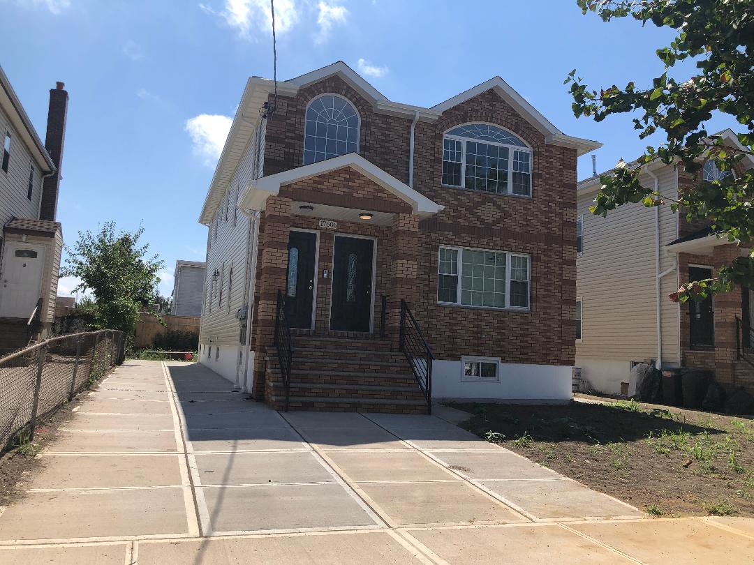 This gorgeous new 2 family home in Springfield Gardens located in a 40X100 lot size with 3 BR, 2 Bath on each floors, solid wood floor, full finished basement with full Bath. Private driveway, CAC  & heat throughout the house. conveniently located to all amenities. Must see this lovely home.