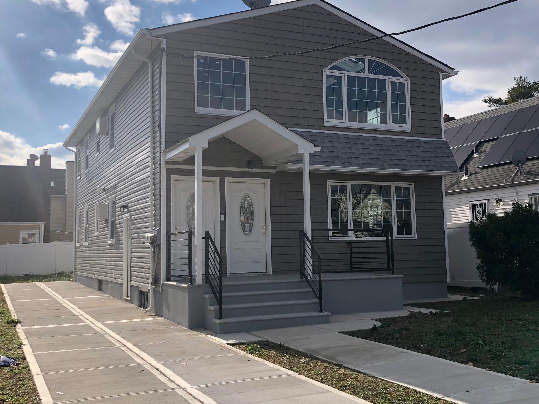 A gorgeous new 2 family home 40X100 , detached in desirable Rosedale area. It offers 3 BR, 2 Bath on each floor, Laundry connection o each floor, beautiful kitchen with high end appliances, wood floor through out the house, finished basement , huge driveway and more