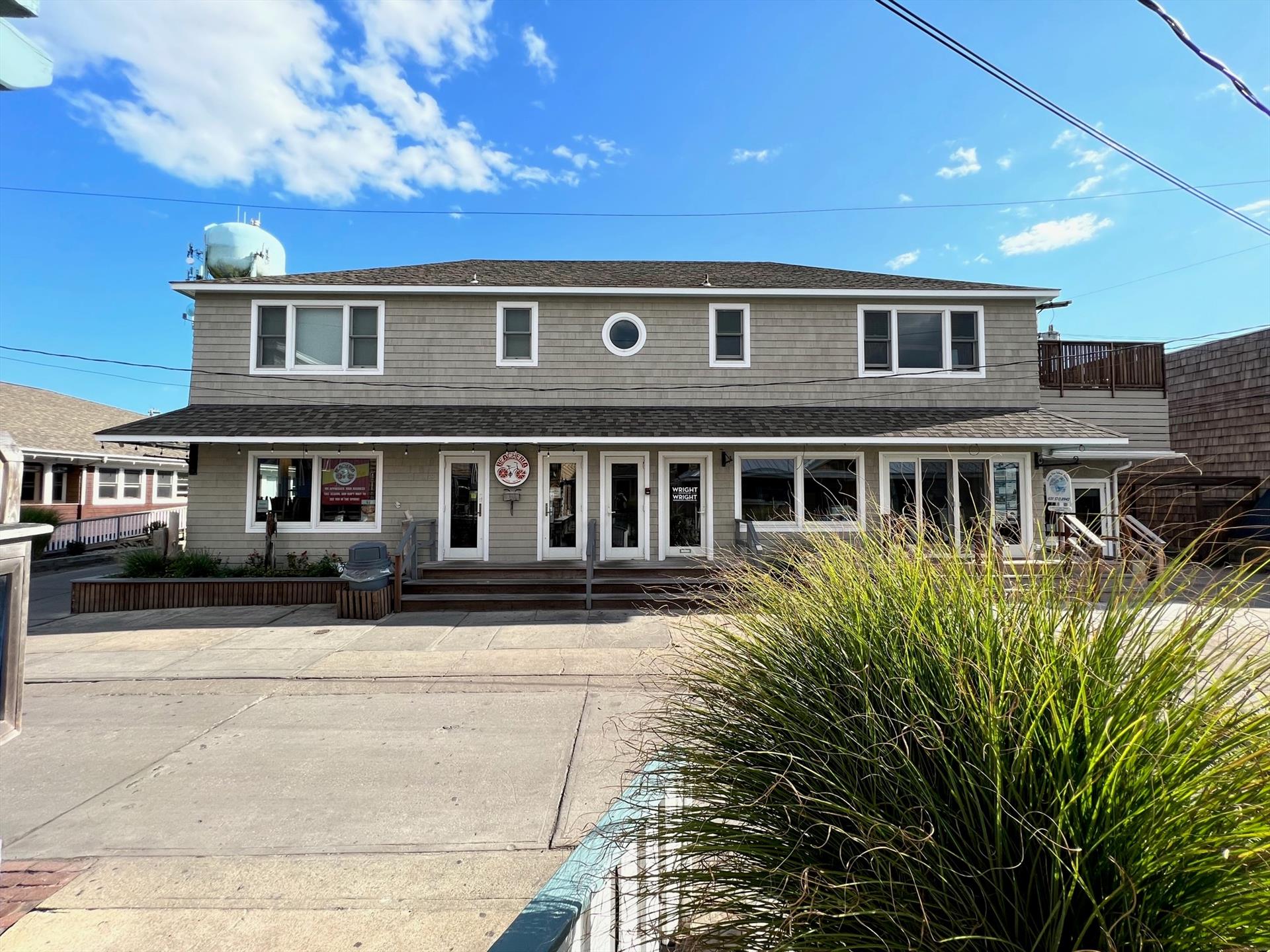 Rare commercial mixed-use building located in the heart of Ocean Beach. Offering four store fronts, as well as two apartments on the second level, this building is great for rental income! Call Robin Citriniti for expense info and more details, 631-583-6100!