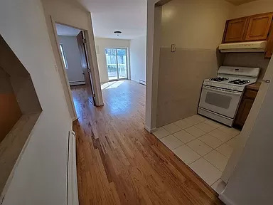 Beautiful Second floor Apartment For Rent In Middle Village features Living Room, Dining Room, Eat In Kitchen, Three Bedrooms And 2 Full Bathroom. Master Bedroom W Full Bath. Ample Closet Space. Hardwood Flooring Throughout. Close To All shops And Transportation.