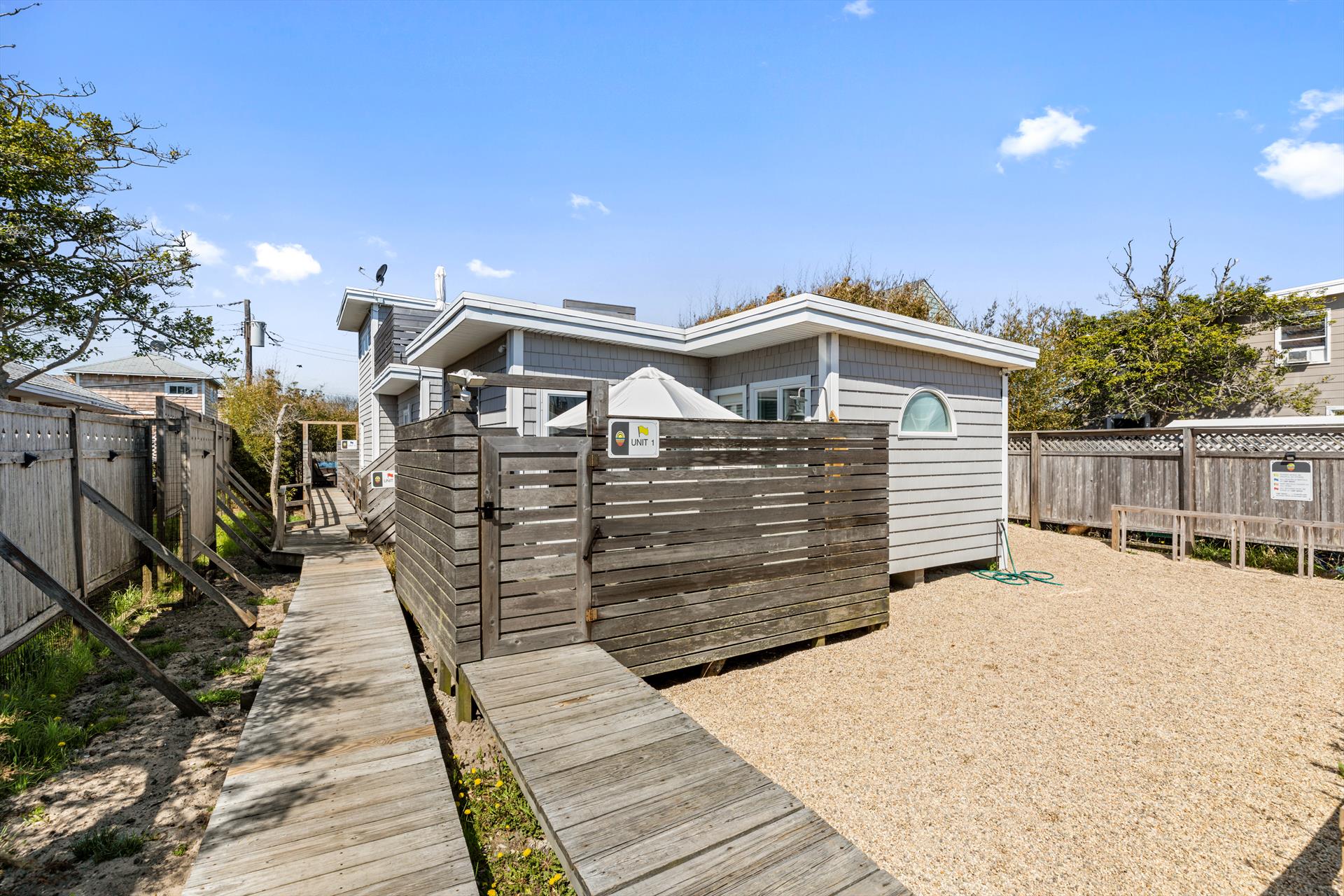 Rare opportunity to own a 3 family home on Fire Island! Tons of upgrades, including all new roof, new roof deck, and Mini Split AC system throughout. Ideally located in the heart of Ocean Bay Park, this property is ideal for an investor or a savvy buyer looking to utilize one unit and rent out the other two.  Why pay your mortgage when you can have tenants pay it for you, and still get to enjoy your property?  The property has 3 separate apartments, each with its own private entrance and outdoor space.  The front unit has 1 bedroom, 1 bathroom, and its own gated, private deck area.  The middle unit has been tastefully updated, and has 1 bedroom , 1 full bathroom, and its own beautiful roof deck.  The rear unit is the largest, featuring 2 bedrooms, 1 full bathroom, a renovated kitchen, spacious living area, and private deck area with laundry and an outdoor shower.  Low taxes only $5,135! Affordable flood only $797. Rare opportunity! <br> Rental History: <br>
2020: 125k <br> 
2021: 145k <br>
2022: 146k now fully booked