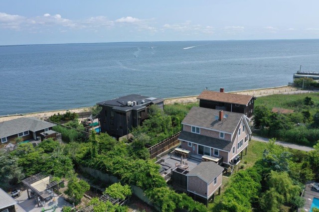 Gorgeous and renovated 5 bedroom, 2 bath home with bay views in Seaview ! High end kitchen & large private deck with a bar 