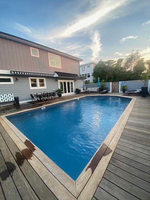 Completely renovated 4 bedroom, 3 full bathrooms in the heart of Ocean Beach with a pool! Spacious & sunny back deck. Available for rent Summer 2024! Only a 2 minute walk to the beach and a 5 minute walk into downtown Ocean Beach for dining, shopping, entertainment & ferry. 