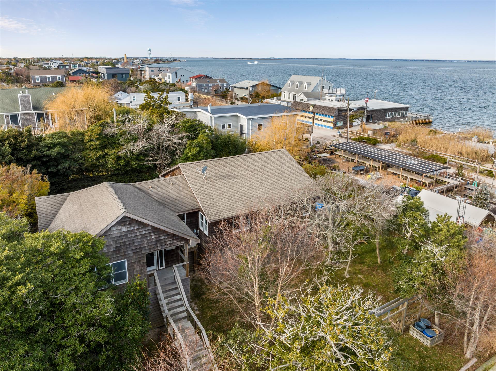Discover the epitome of coastal living in this recently remodeled gem boasting 3 bedrooms, 2 full baths, and an additional versatile den area that could easily transform into a fourth bedroom. Nestled in the heart of Ocean Bay Park, this classic Fire Island home seamlessly blends timeless charm with modern elegance.
<br>
<br>
Step into a world of comfort as natural light floods the open living spaces, highlighting the thoughtful updates and impeccable design. The heart of the home, the kitchen, is a culinary haven with top-of-the-line appliances and stylish finishes, making meal preparation a joy.
<br>
<br>
Immerse yourself in the tranquility of island life on the beautiful Ipe decks, perfect for savoring morning coffee or entertaining under the stars. Picture-perfect views of the bay provide a stunning backdrop to every moment, creating a serene ambiance that defines coastal living.
<br>
<br>
This home sits on an oversized 100 x 100 lot, offering an expansive outdoor oasis that includes a refreshing pool—a private retreat to unwind and bask in the Fire Island sunshine. The spacious layout, coupled with the potential for the den to become an extra bedroom, ensures there's room for everyone to enjoy this seaside haven.
<br>
<br>
Incorporating a seamless blend of style and functionality, this property is a true testament to luxury island living. Whether you're looking for a year-round residence or a vacation escape, this home in Ocean Bay Park offers the perfect balance of relaxation and entertainment.
<br>
<br>
Don't miss the chance to make this classic Fire Island residence your own! Contact us today to schedule a private tour and experience the coastal lifestyle that awaits in this breathtaking home. 