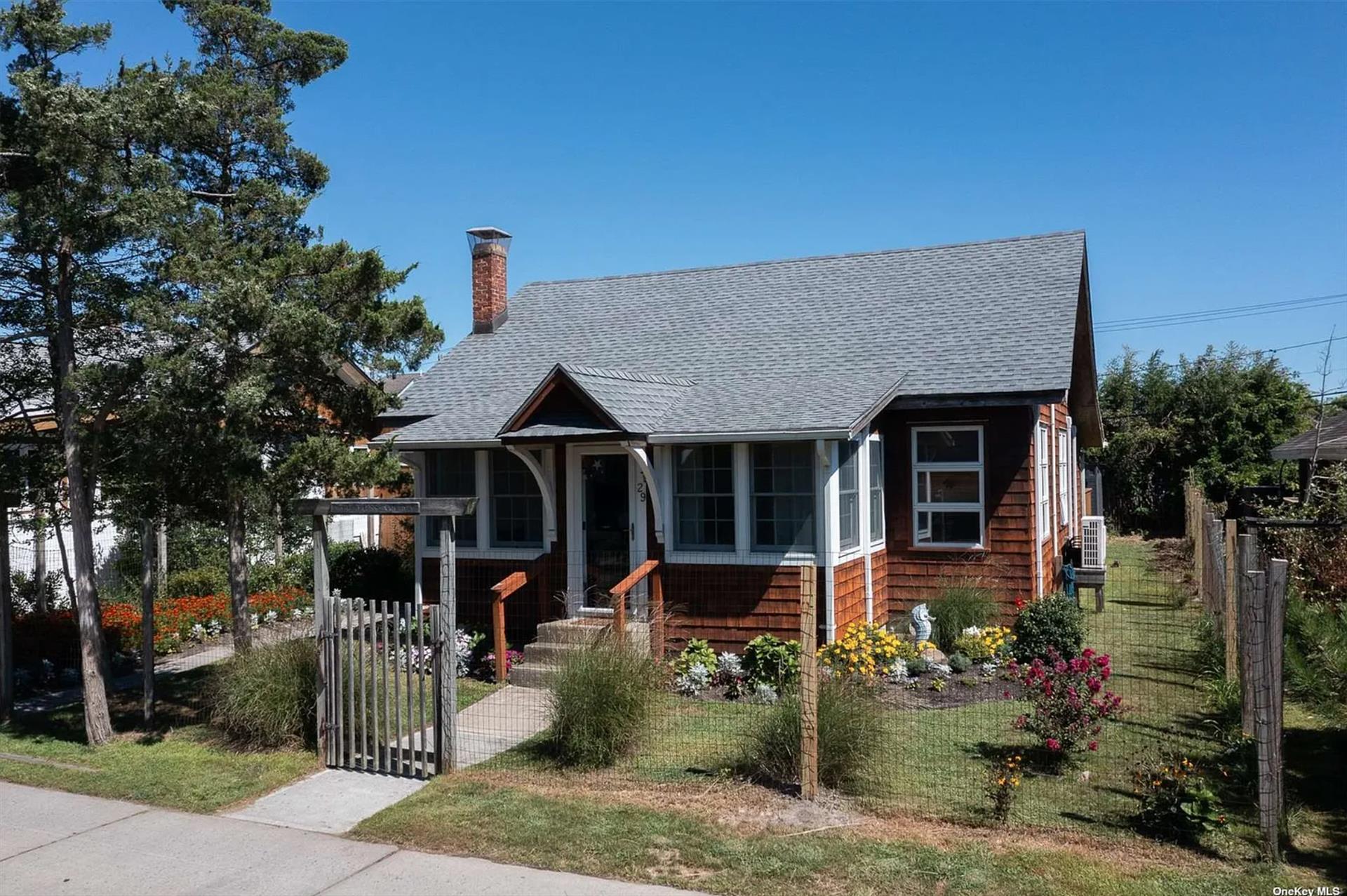 Welcome to 29 Ocean Rd, Ocean Beach!  This beautifully kept home has an open floor plan with an enclosed porch,  three-bedrooms, 1.5 bathrooms & hardwood floors. Back yard has been updated with new deck & outdoor shower. Property is 50 X 104, large enough to add a pool. This setup would offer a perfect blend of beachy relaxation with modern upgrades such as kitchen, bathrooms & AC/heat split units.