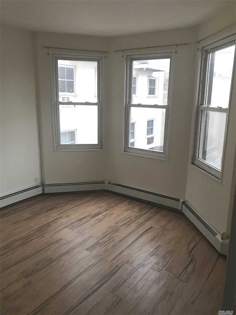 Beautiful 2 Bedroom Apartment for Rent in Middle Village. Features Living/Dining Room Combo, Eat-in-Kitchen, Small Office and 1 Full Bath. Hardwood Flooring Throughout and Lots of Windows. Conveniently Located Near Shopping, Buses & M Train.