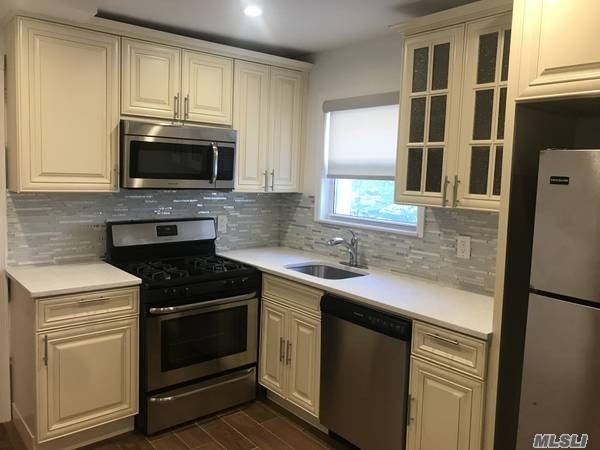 Newly Renovated 2 Bedroom Apartment for Rent. Features a Living/Dining Room Combo, Brand New Kitchen and 1 Full Bath. Hardwood & Tile Flooring Throughout. Water, Heat & Gas Included. Conveniently Located Near Shopping & Transportation!