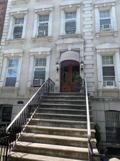 Beautiful 2 BR apartment in a Hudson St. brownstone.  Updated kitchen with granite counters and stainless appliances including dishwasher and microwave.  Updated bath.  Large living room and formal dining room.  One large bedroom and one smaller bedroom (can be an office or den also).  Lots of light from oversize windows. Heat and Hot Water included in rent.  Washer and dryer located in basement.