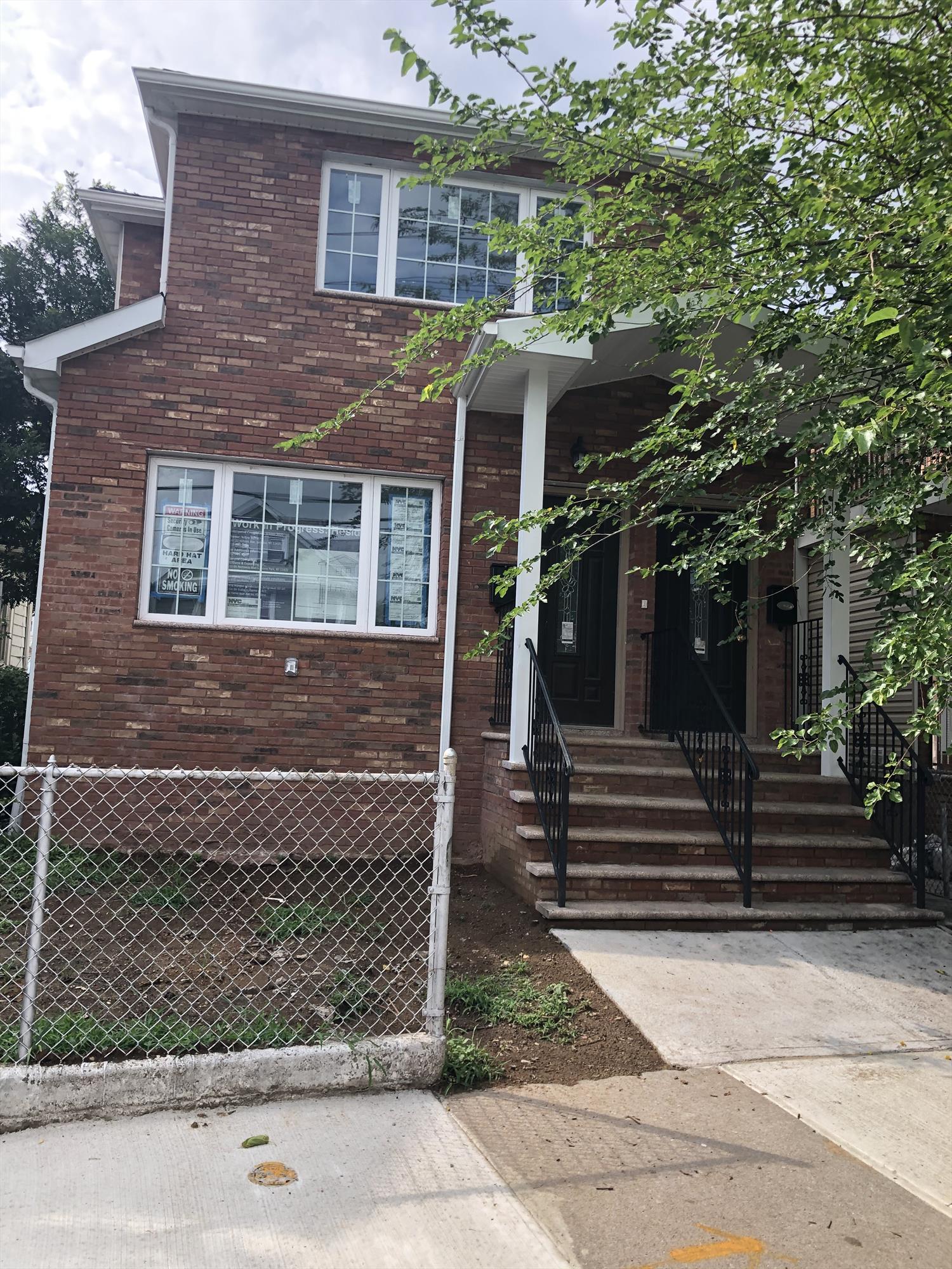 A spacious new 2 family home located in Jamaica. It is detached with private driveway. Each floor offers 3 BR and 2 full Bath with beautiful modern kitchen with stainless steel appliances and wood floor throughout the house. Full finished basement and full bath. won't last.