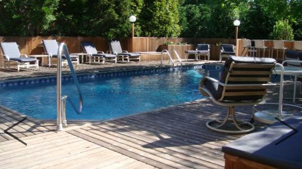 Beautiful 4 bedroom, 3 bath Seaview home with a large pool, pool house & sauna !