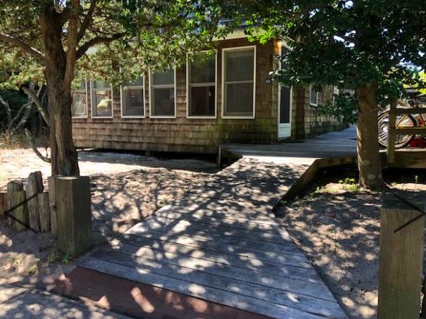 Very close to the beach, this 3 bedroom, 1 bath home with a sleeping loft and sleeping porch. 