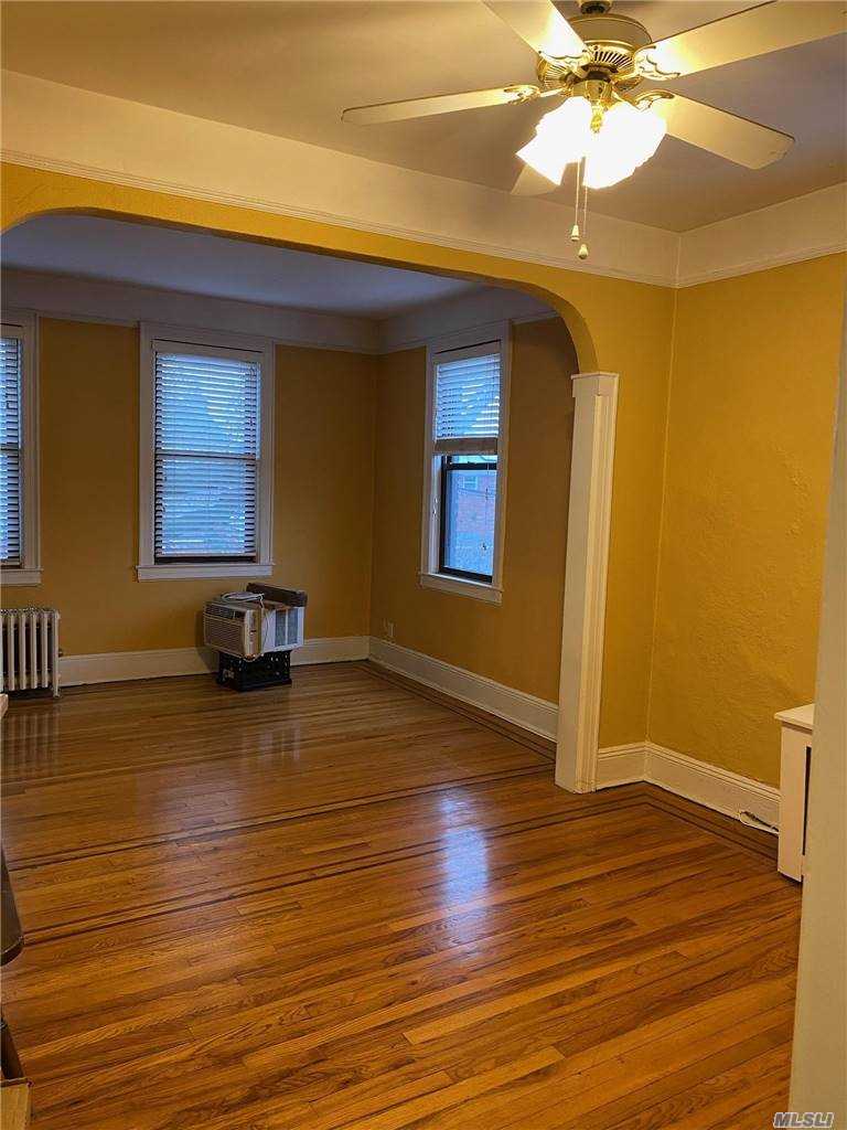 Beautiful Updated 2 Bedroom Apartment for Rent in Whitestone. Features Living Room with lots of Sunlight and High Ceilings, Eat-in-Kitchen, and 1 Full Bathroom. Hardwood Flooring Throughout. Heat and Water is Included. Convenient to Transportation and Shops.